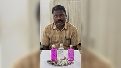 TGSPDCL employee Kondaiah with a positive bribery test and bribe money