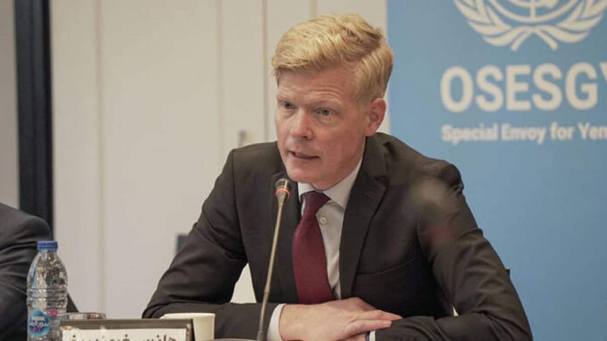 UN Special Envoy for Yemen, Hans Grundberg, speaking at a press conference with OSESGY banner in the background.