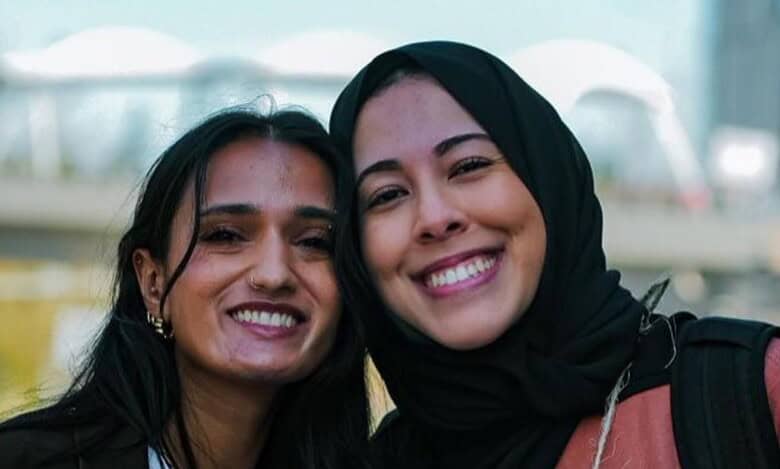 The image displays the pictures of now terminated Microsoft employees - Ibtihal Aboussad and Vaniya Agrawal- in April 2025