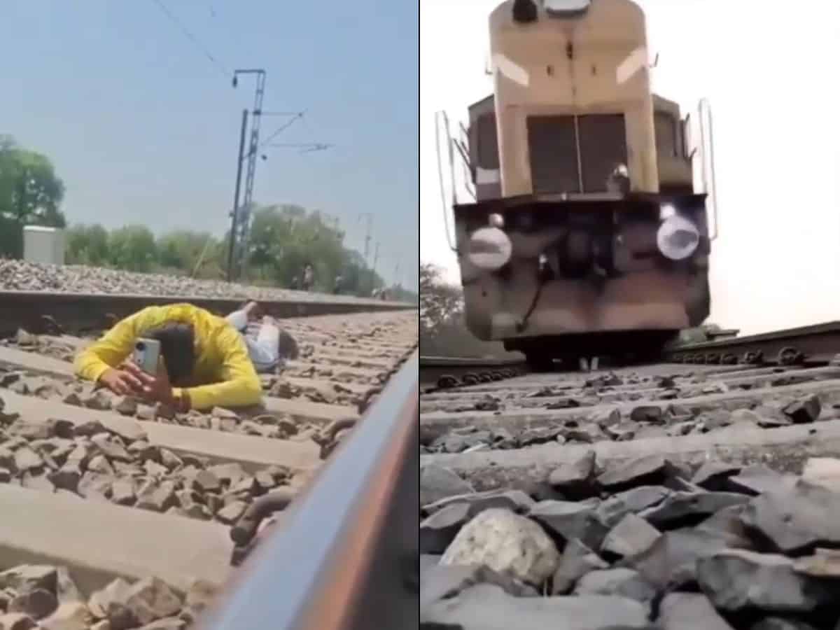 There are two images in this. The first image shows a young man in yellow shirt laying on a railway track with hi head down and a mobile. The second image shows an incoming train