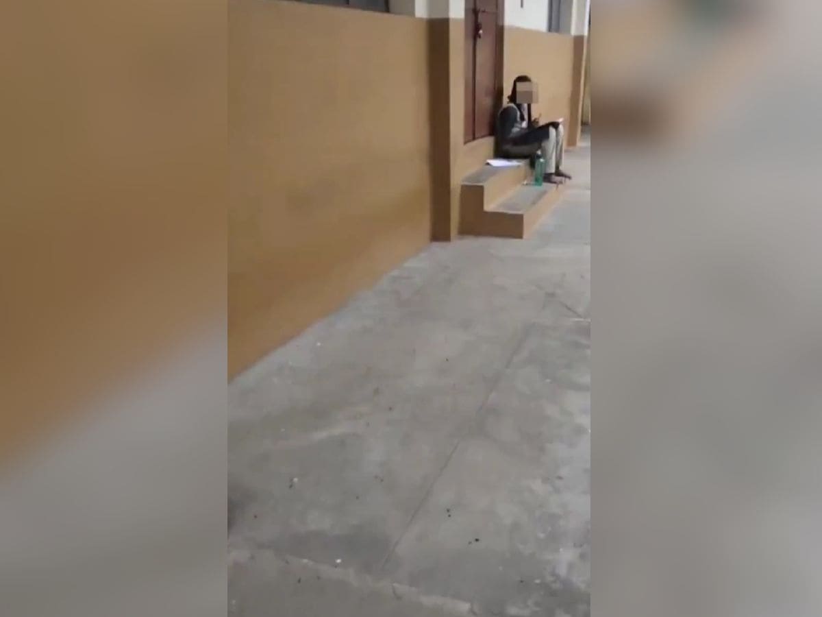 The image shows a student whose face is blurred sitting outside a class dated April 10, 2025