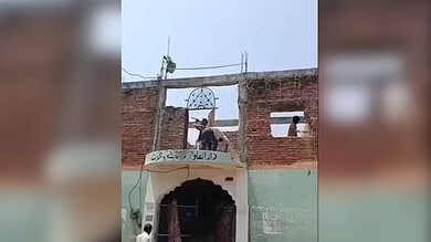 The image displays the demolition of madarsa in Madhya Pradesh. April 13, 2025