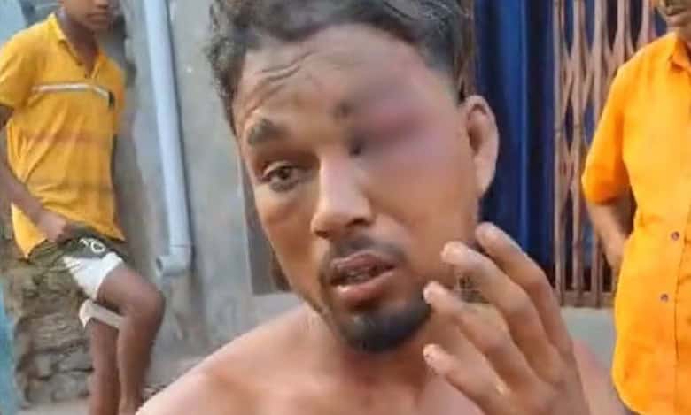 The image shows a young man beaten up in Chhattisgarh . April 13, 2025