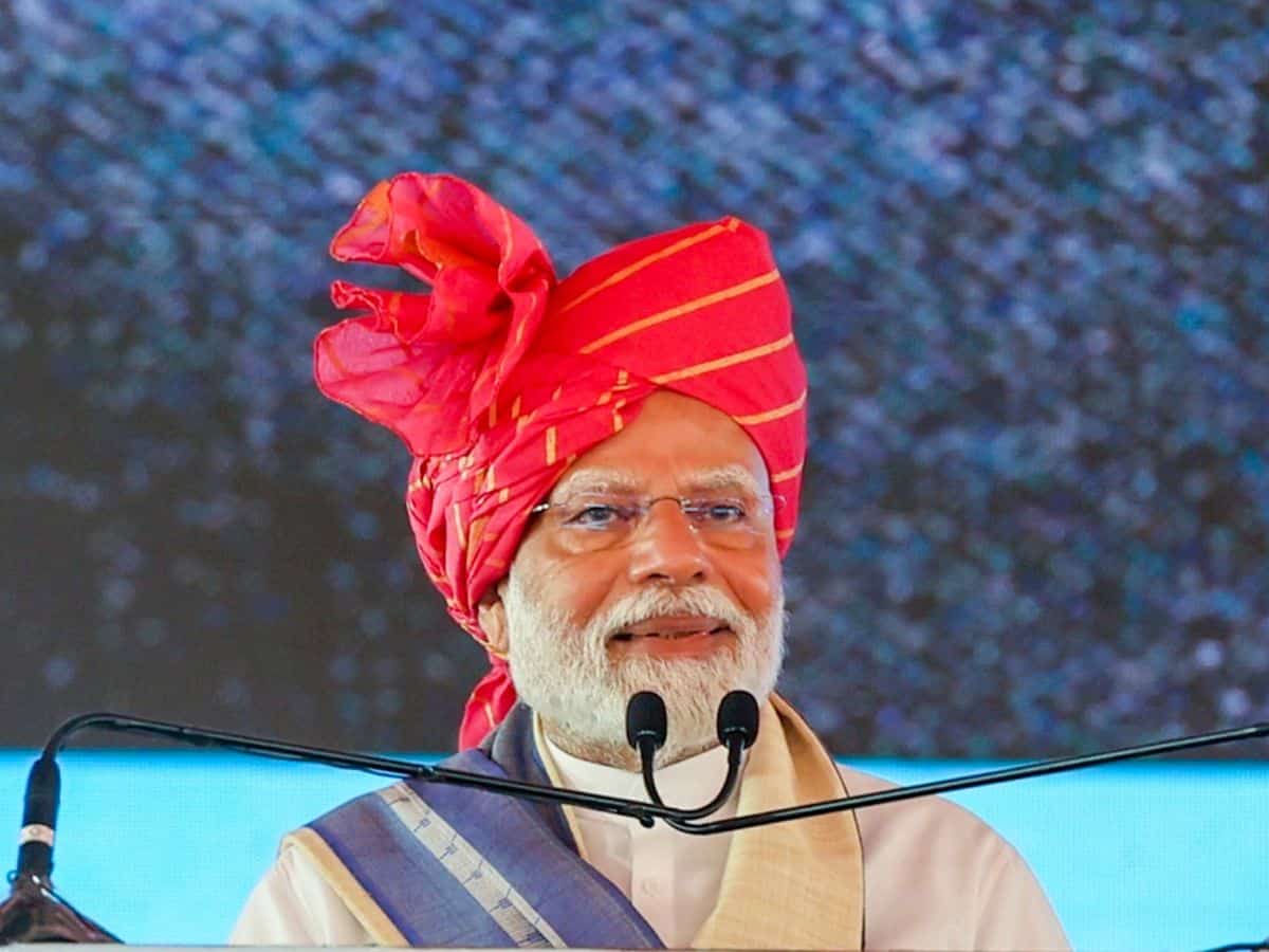 The image displays a picture of Prime Minister Narendra Modi, April 14, 2025