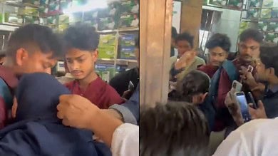 The image displays an angry mob attacking a Muslim woman in UP's Muzaffarnagar. April 14, 2025