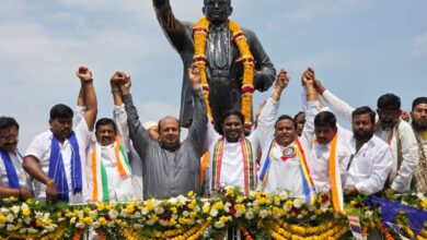The image displays Congress leader and MLC Amer Ali Khan participating at a bike and car rally from Adilabad to mark Dr BR Ambedkar’s birth anniversary. April 14, 2025