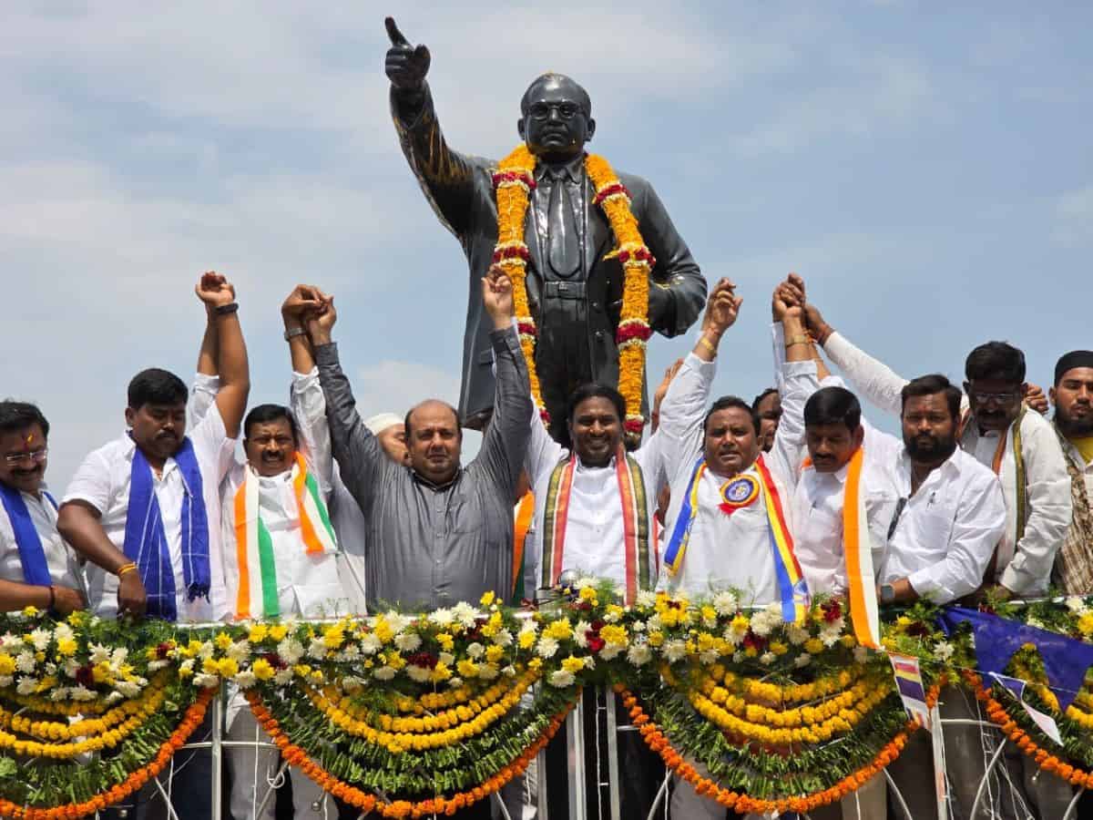 The image displays Congress leader and MLC Amer Ali Khan participating at a bike and car rally from Adilabad to mark Dr BR Ambedkar’s birth anniversary. April 14, 2025