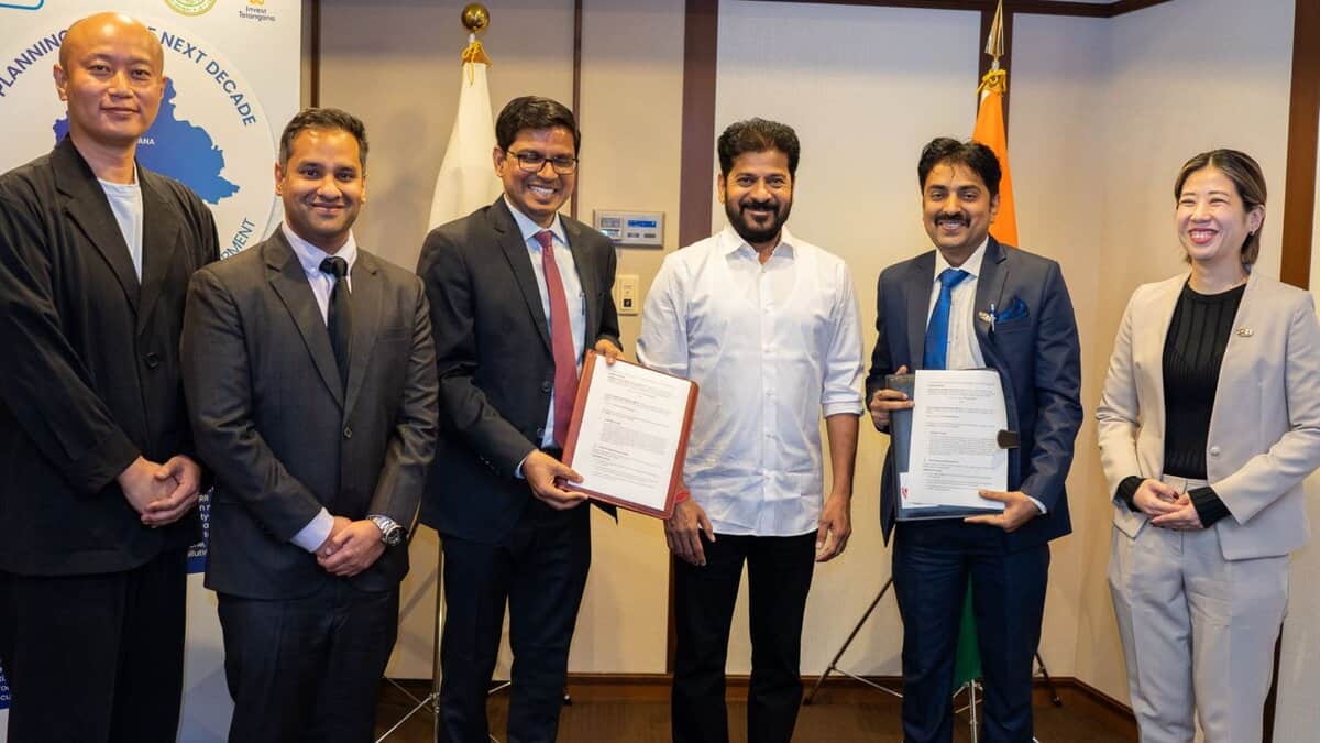 The image displays a picture of Telangana CM Revanth Reddy in Tokyo. April 19, 2025