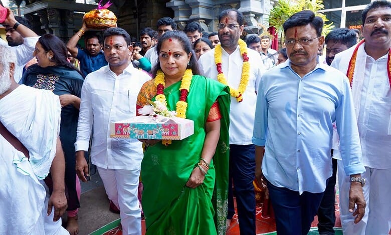 The image displays BRS MLC K Kavitha visiting Sitarama Chandra Swamy temple in Bhadrachalam, April 21, 2025.