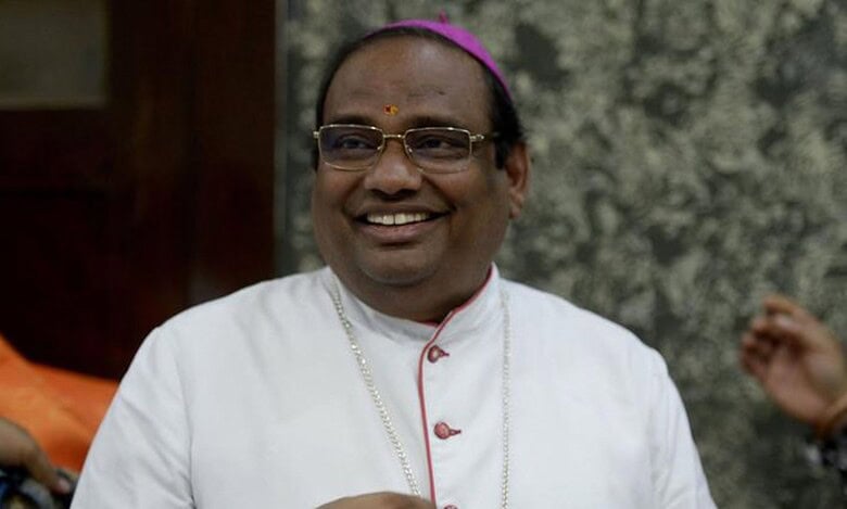 The image displays a picture of Archbishop Anthony Poola. April 22, 2025