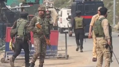 the image displays a picture of Army personnel after a firing incident was reported in Kashmir's Pahalgam