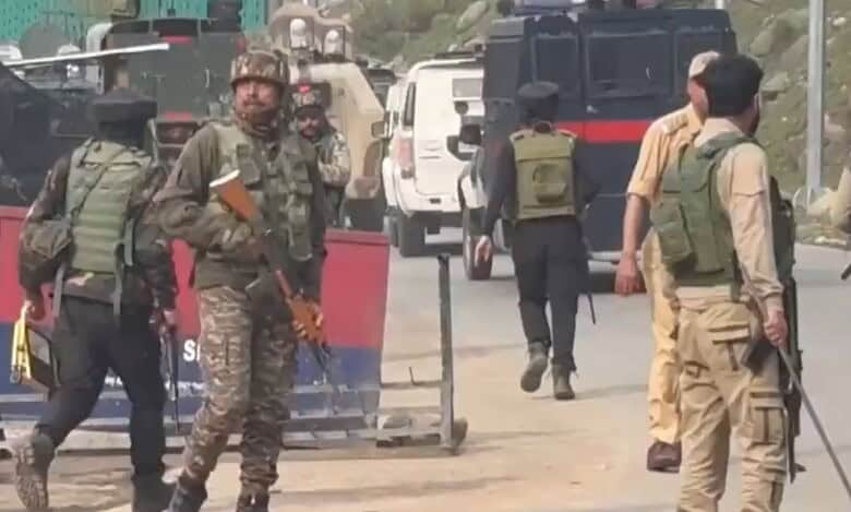 the image displays a picture of Army personnel after a firing incident was reported in Kashmir's Pahalgam