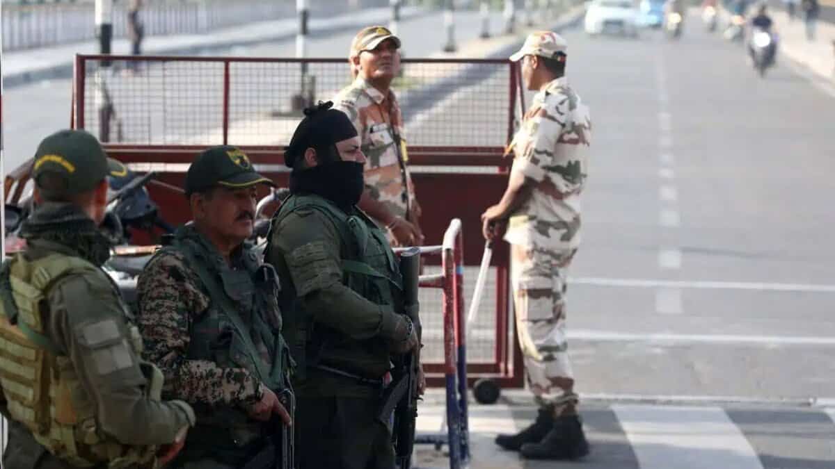 The image displays a picture of security forces personnel guarding a check point a day after Pahalgam terrorist attack in Jammu on Wednesday, April 23