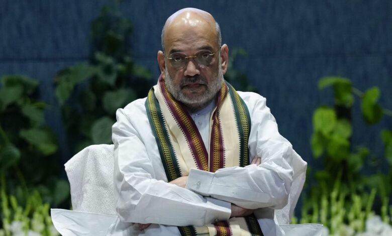 The image displays a picture of Union Home Minister Amit Shah