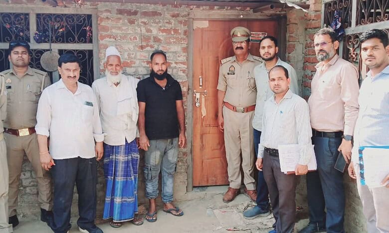 The image displays a picture of district magistrate of Shravasti along with police official after demolishing "illegally operated and unrecognised madrasas."