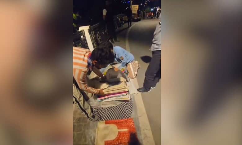 The image displays a picture of Kashmiri shawl sellers in Mussoorie