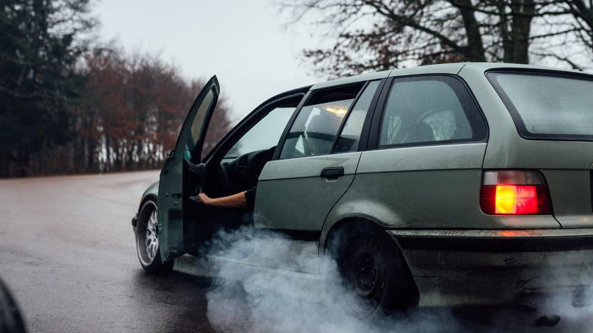 Representational Image of car emitting smoke