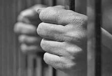Man behind bars