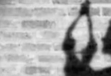 Representational Image of man hanging himself