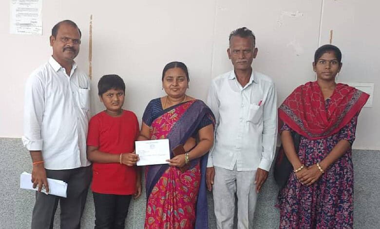 Swadesh Parikipandla with Vignaan and family submitting a petition for Gurukulam school admission support in Telangana.