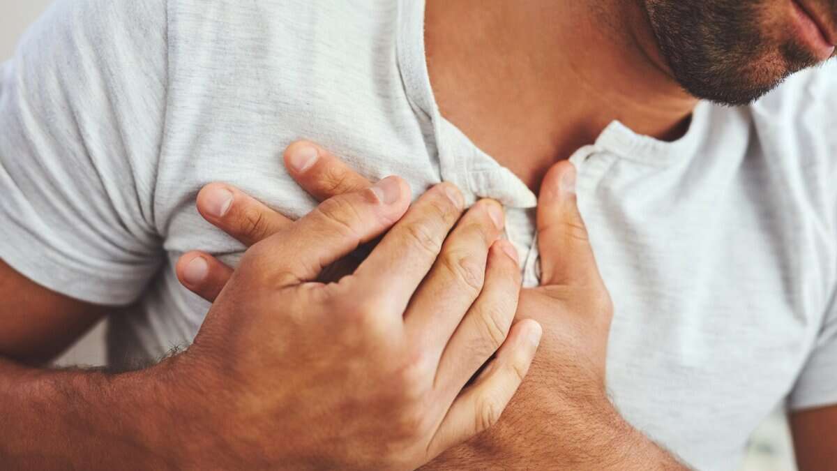 A Representational Image of man holding his heart