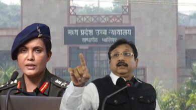 Colonel Sofiya Qureshi on the left and Kunwar Vijay Shah with MP HC in the background