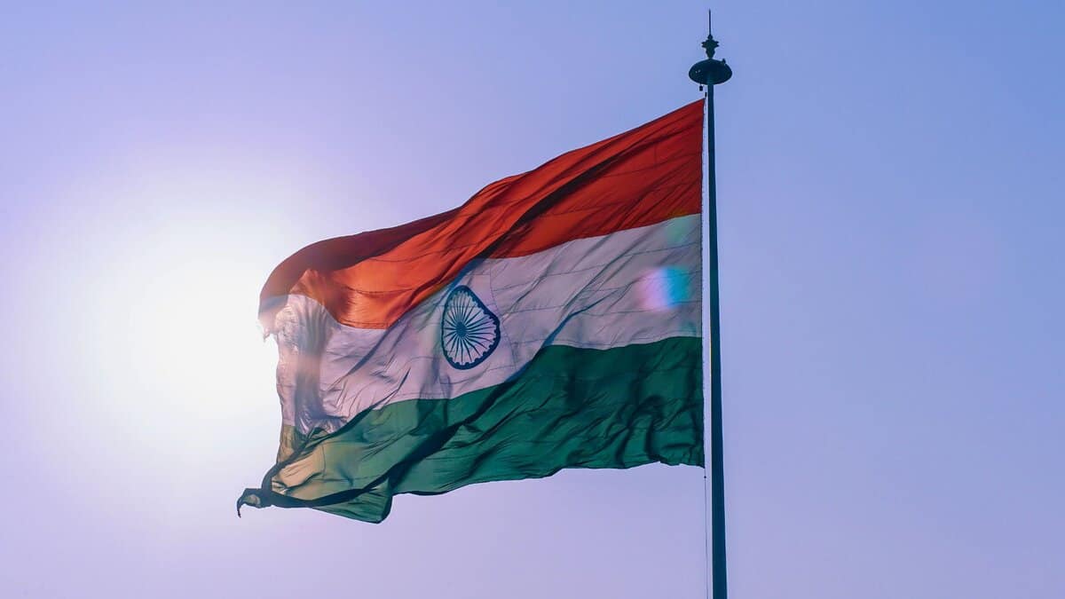 The India flag hoised on a pole with the sun behing for a flag march story in Hyderabad