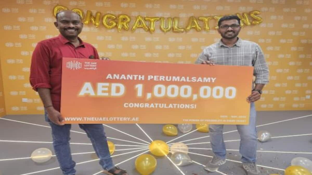Ananth Perumalsamy, receives the prize money after winning the UAE Lottery