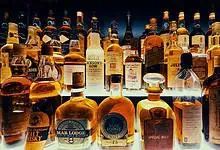 A number of liquor bottles lined up for liquor in Hyderabad copy