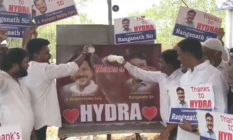 Residents of Firzadiguda pour milk on pictures of Telangana chief minister Revanth Reddy and HYDRAA commissioner AV Ranganath to celebrate HYDRAA’s removal of encroachments from cemetery land.