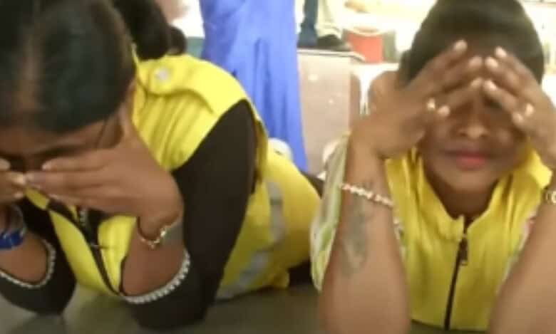 Students take shelter under the table as part of mock drill in Hyderabad