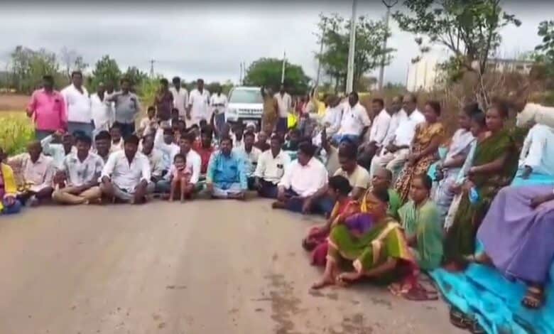 The image displays a picture of Hyderabad: Paddy farmers of Telangana staging a protest on Wednesday,