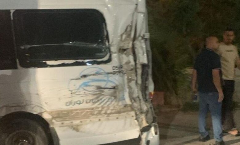 The image display a picture of a crushed van carrying Palestinian Haj pilgrims