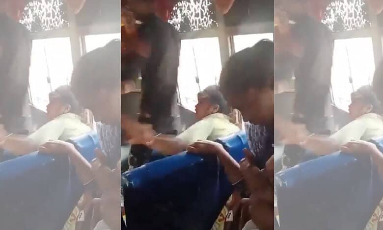 The image displays a picture of a Dalit girl being assaulted by men for resisting molestation in UP on May 2