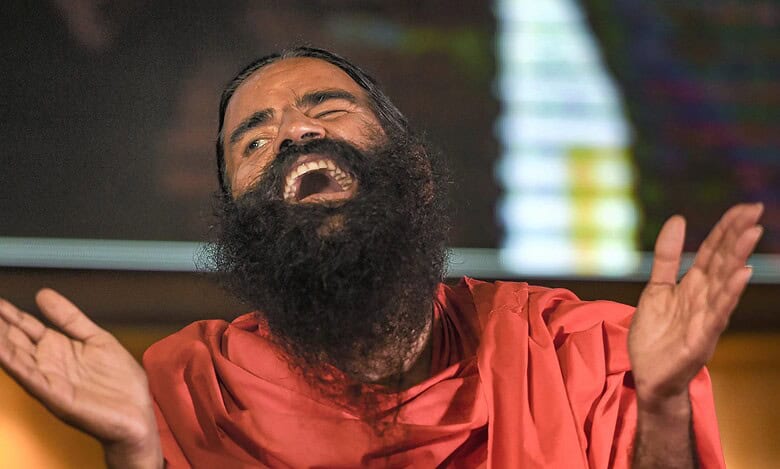 The image displays a picture of Baba Ramdev