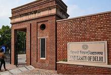 The image displays a picture of Delhi University