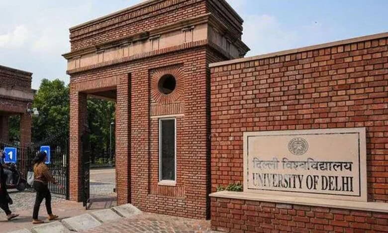 The image displays a picture of Delhi University