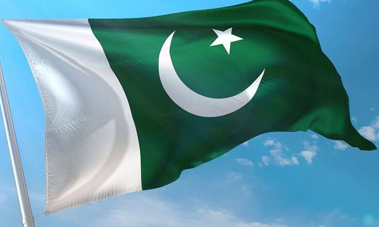 The image displays a picture of a Pakistani national flag