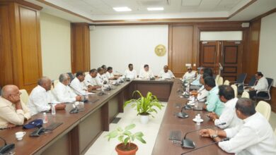 The image displays a photo of state transport minister Ponnam Prabhakar holding talks with TGSRTC union workers leaders at his residence in Hyderabad on Tuesday
