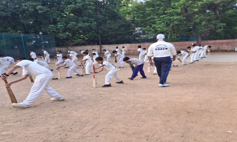 Children practice cricket at the sports coaching camp at Sri Guru Gobind Singh Ji Sports complex in Ameer May 8 2025