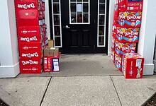 Dum Dum Lollipop boxes are placed outside the boy's house in Kentucky