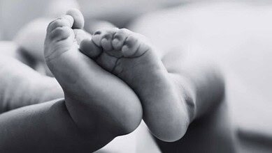 The image displays a picture of a baby