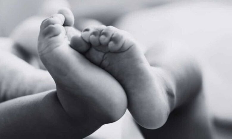 The image displays a picture of a baby