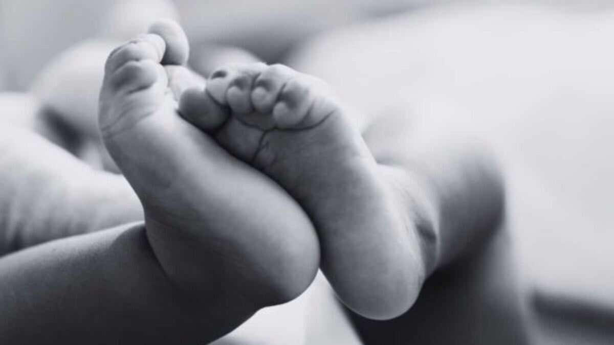 The image displays a picture of a baby