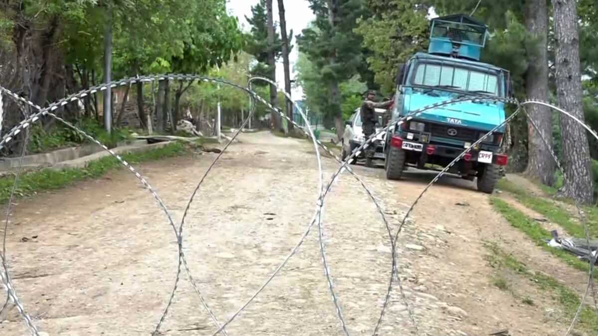 The image displays a scene from an encounter between LeT terrorists and Indian Army in Shopian