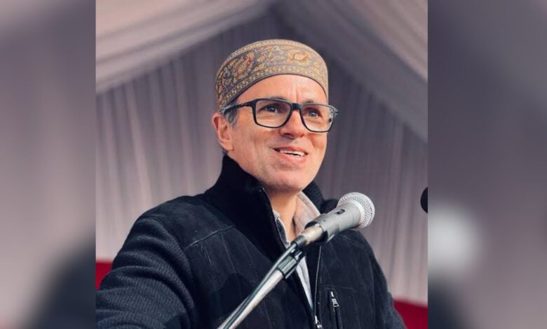 The image displays a picture of J&K chief minister Omar Abdullah