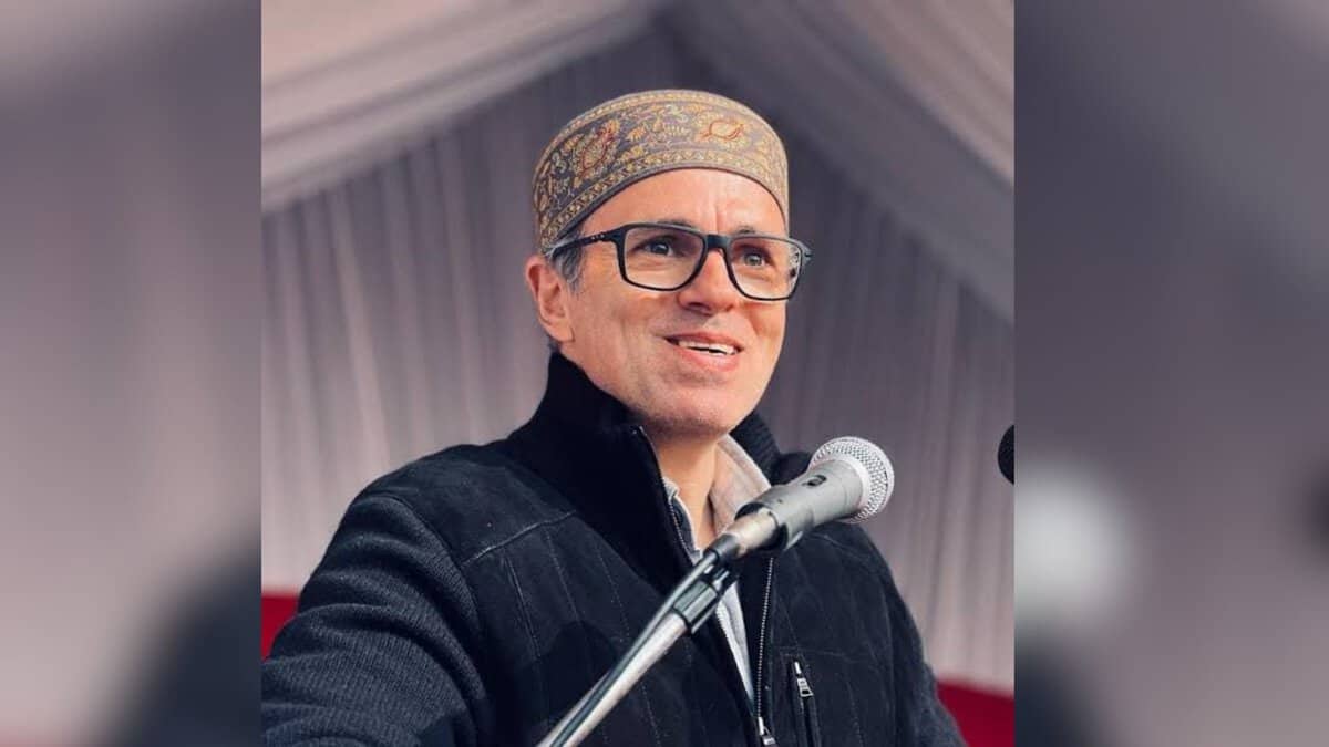 The image displays a picture of J&K chief minister Omar Abdullah