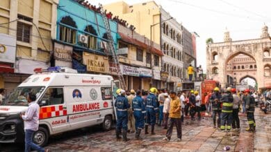 The image shows firefighters carrying out rescue and relief work after a fire broke out in a building near Gulzar Houz in the Old City area of Hyderabad on Sunday