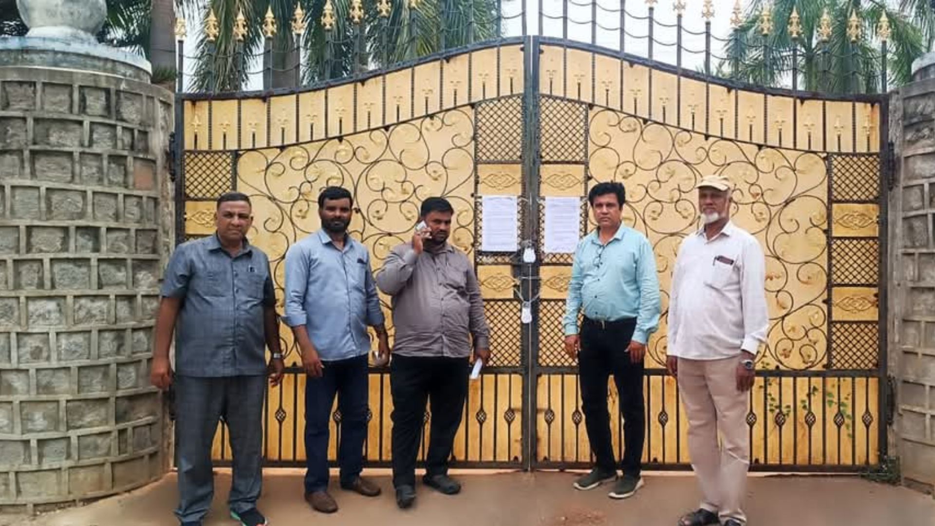 The image displays officials of the Telangana Waqf board