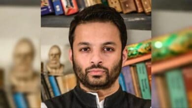 The image displays a picture of Ashoka University assistant professor Ali Khan Mahmudabad